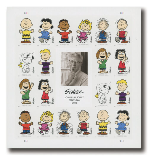 A sheet of 2022 Charles Schulz 100th Birth Anniversary Forever Stamps, featuring 10 different PEANUTS characters with a black-and-white photograph of Charles Schulz in the center.